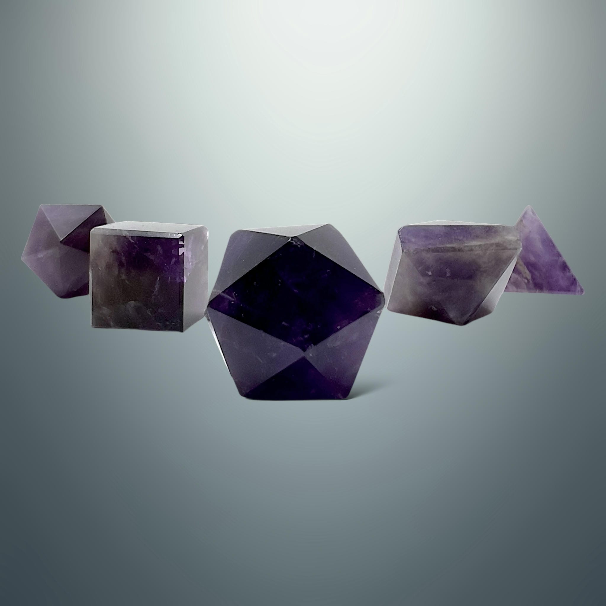 Set de Sólidos Platónicos en Amatista (Caja de Madera)