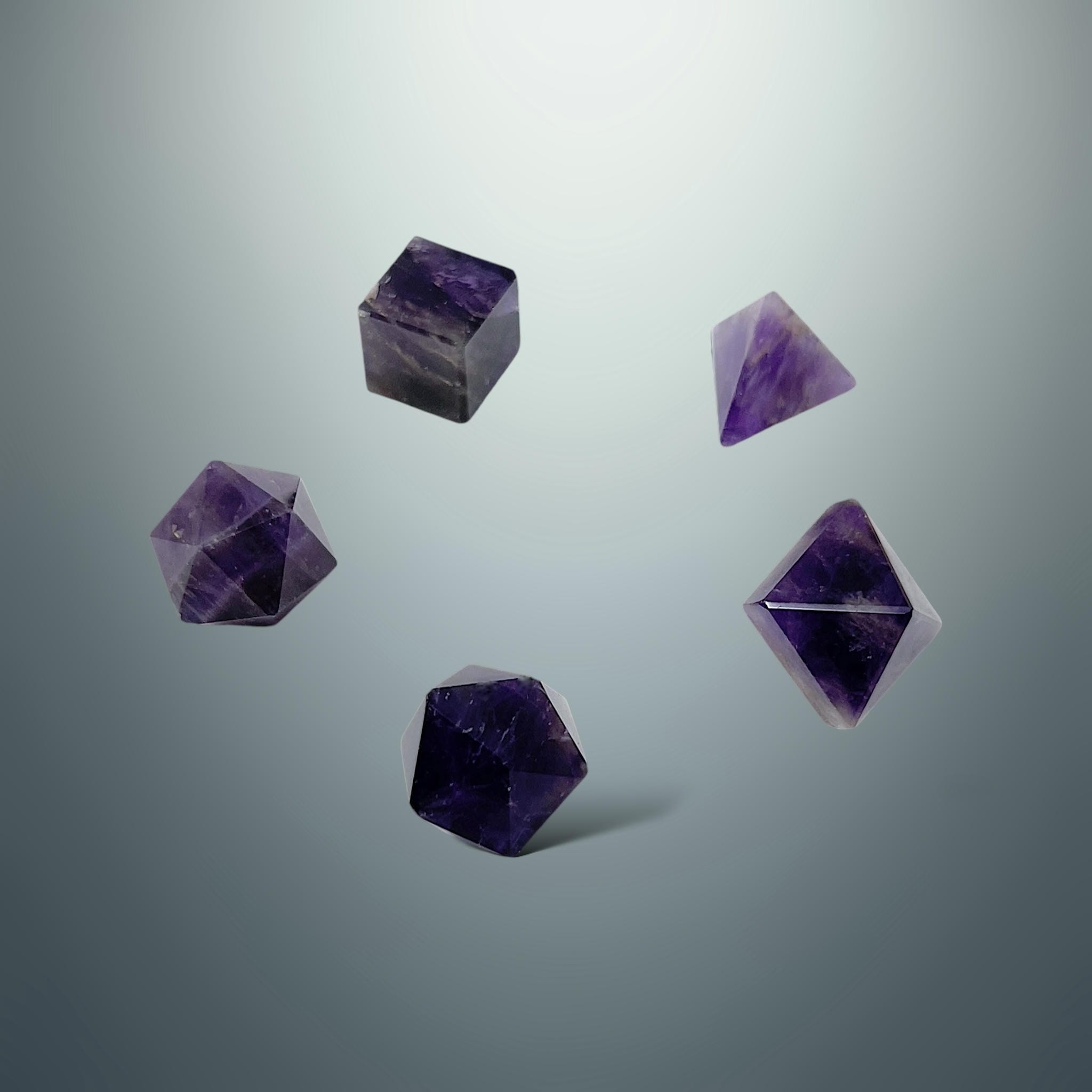 Set de Sólidos Platónicos en Amatista (Caja de Madera)