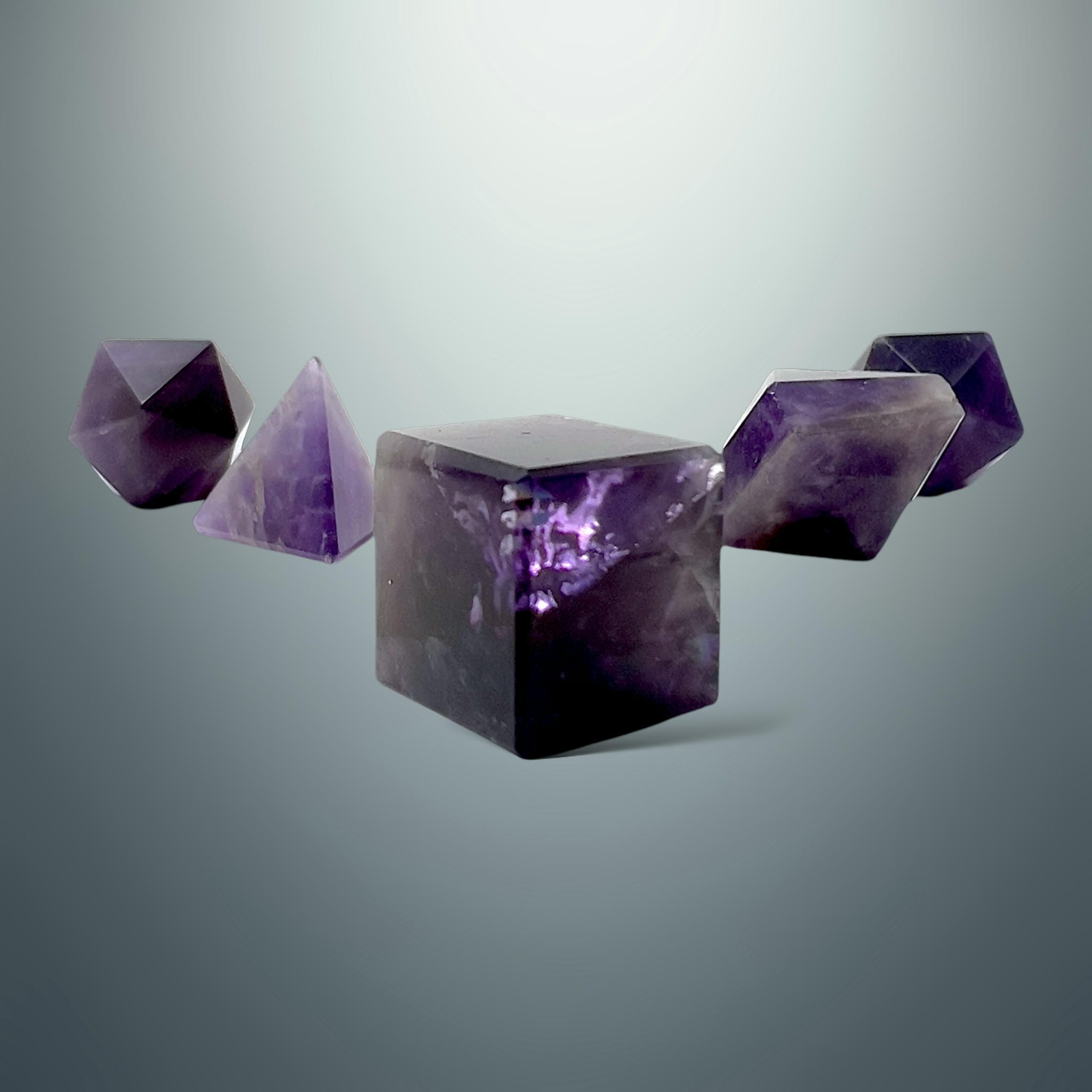 Set de Sólidos Platónicos en Amatista (Caja de Madera)